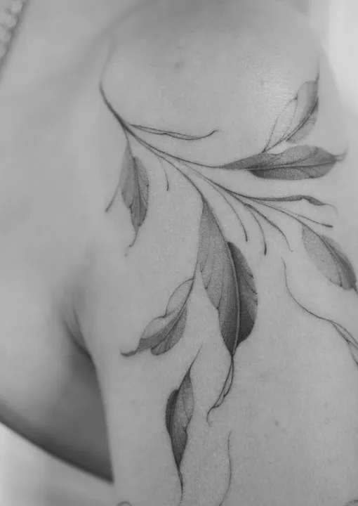 Details of a botanic tattoo made by tattoo artist Nilou from Hamburg