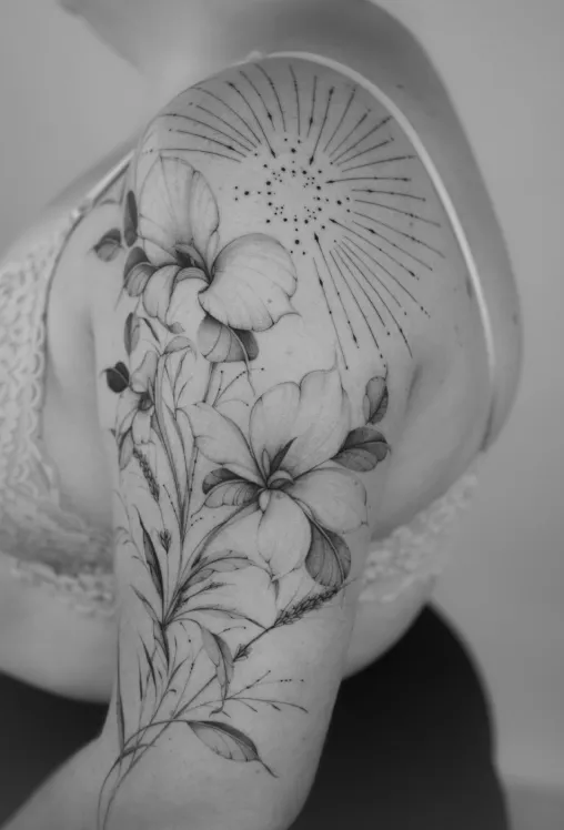 A beautiful ornamental tattoo on arm made by Nilou Tattoo artist based in Hamburg