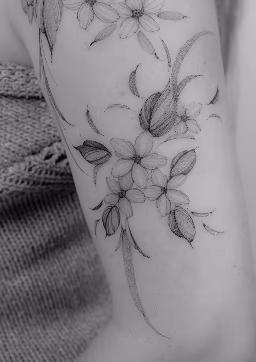 A beautiful floral tattoo art made by Nilou Tattoo | Fine Art Studio