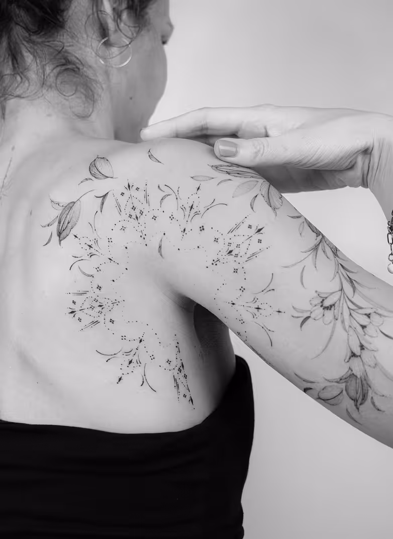 A beautiful floral tattoo art made by Nilou Tattoo | Fine Art Studio